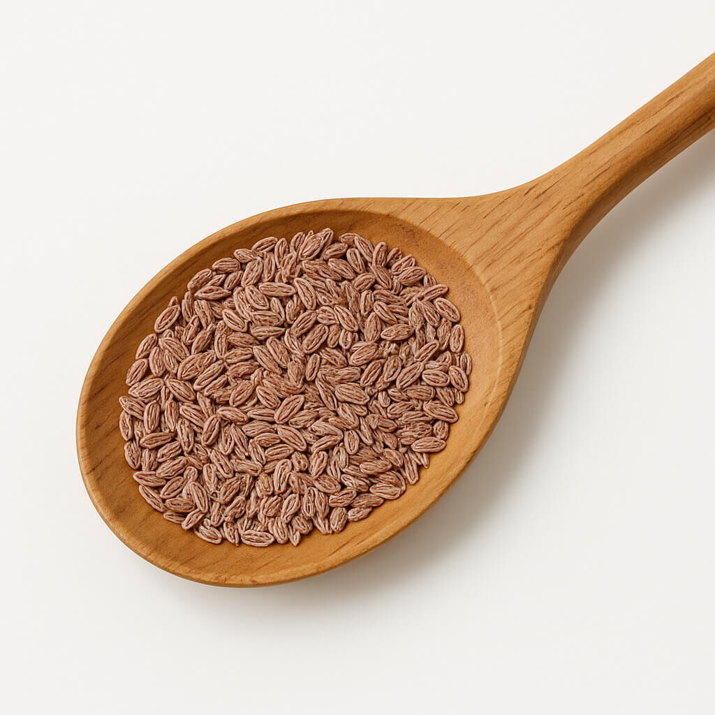 Close-up of wooden spoon filled with seeds