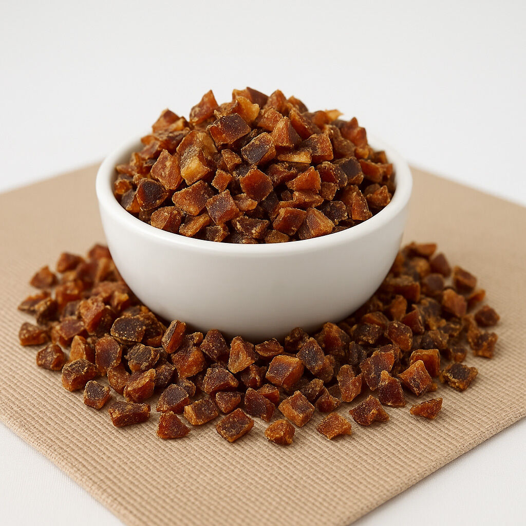 Diced dried apricots in white bowl