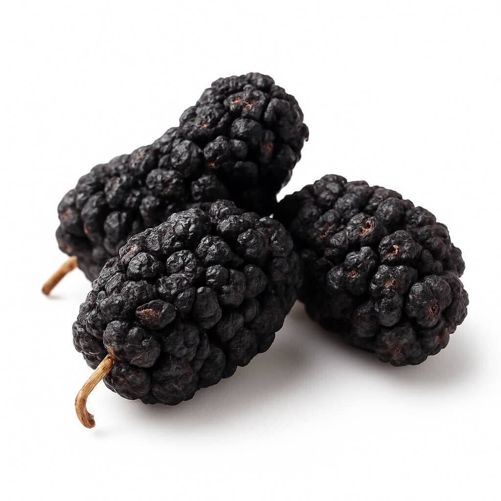 Organic dried black mulberries on white background