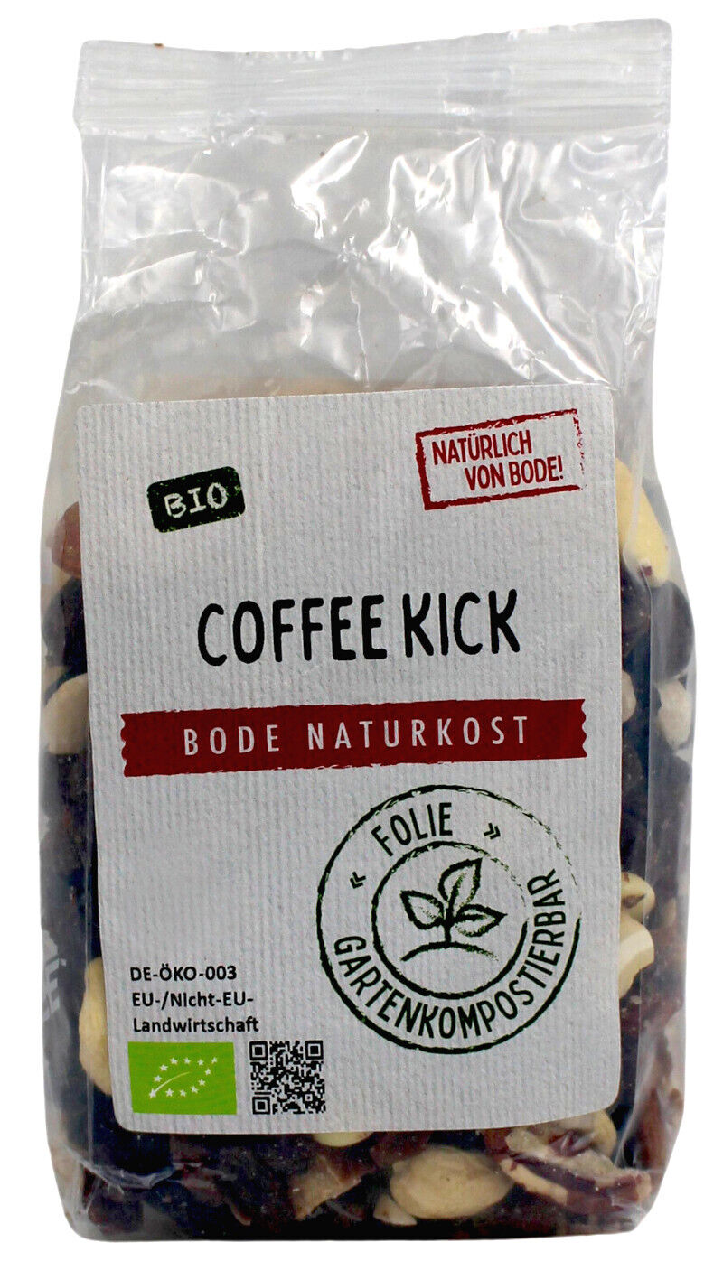 Gennemsigtig pose med mærkat 'Coffee Kick' fra Bode Naturkost; indeholder økologiske kaffe- og chokoladedråber. Etiketten viser økologisk mærke og tekst om komposterbar folie.