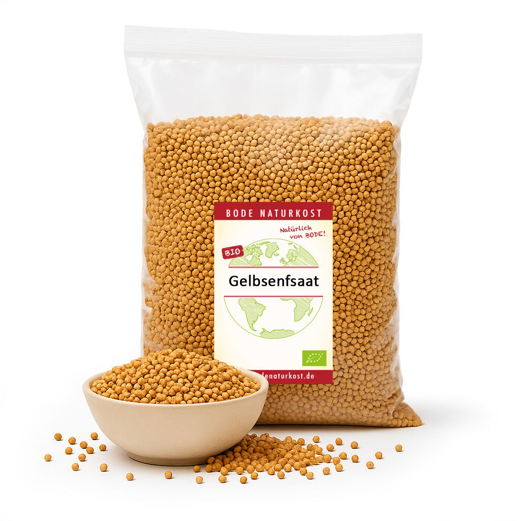 Bag and bowl of organic yellow mustard seeds