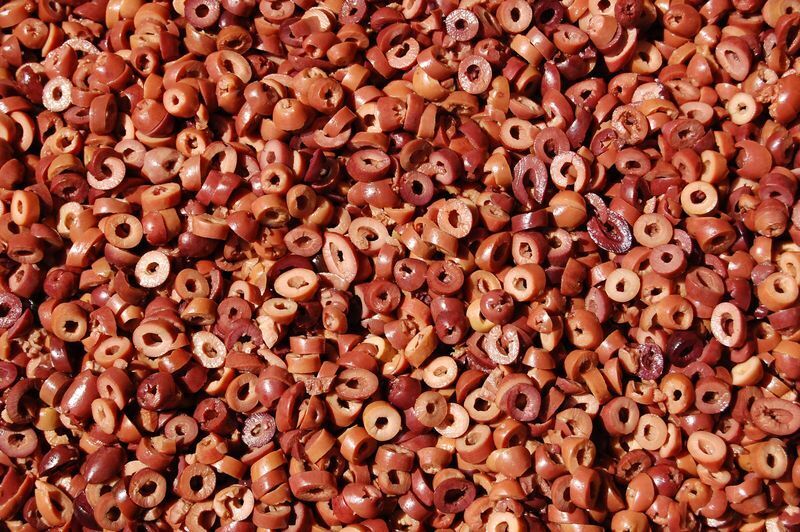 Slices of dark organic olives in brine, 20kg fill weight, net weight 11kg