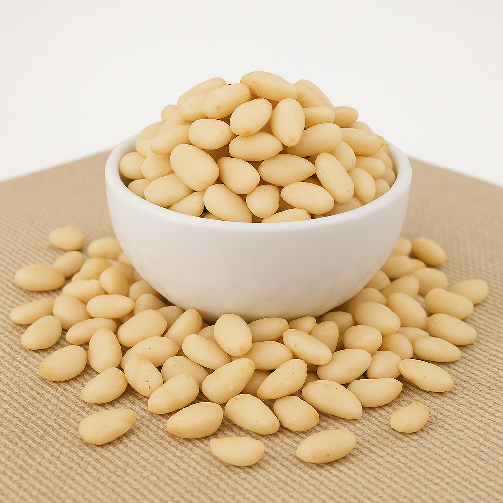 Close-up of shelled pine nuts in a white bowl