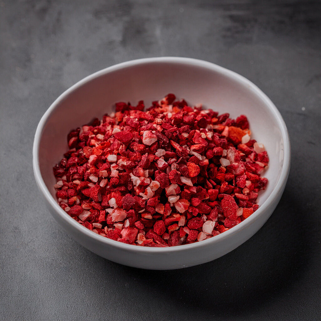 Bowl of crushed freeze-dried strawberries