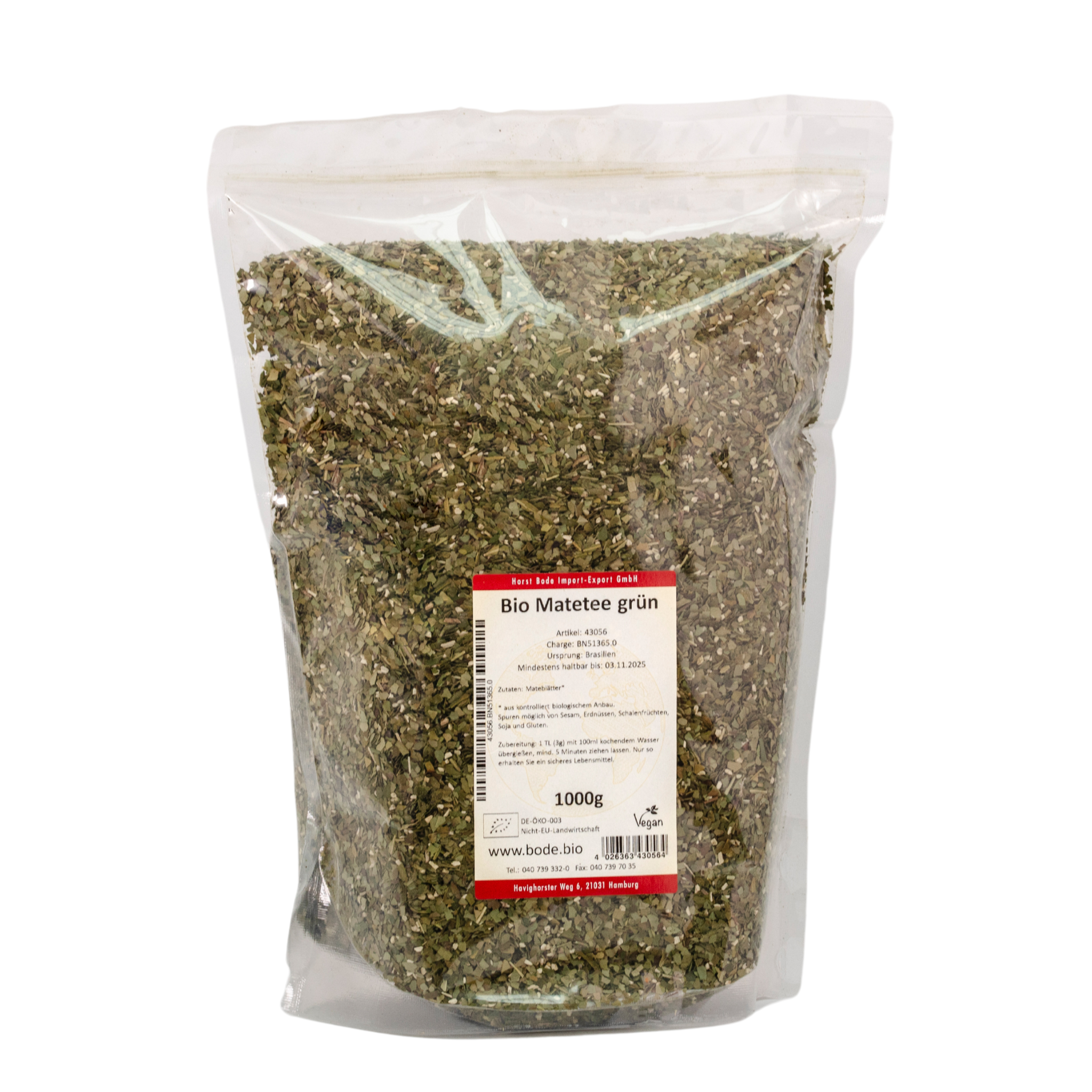 Gennemsigtig genlukkelig plastikpose fyldt med økologisk grøn maté te (1000 g) med en hvid produktetiket på forsiden
