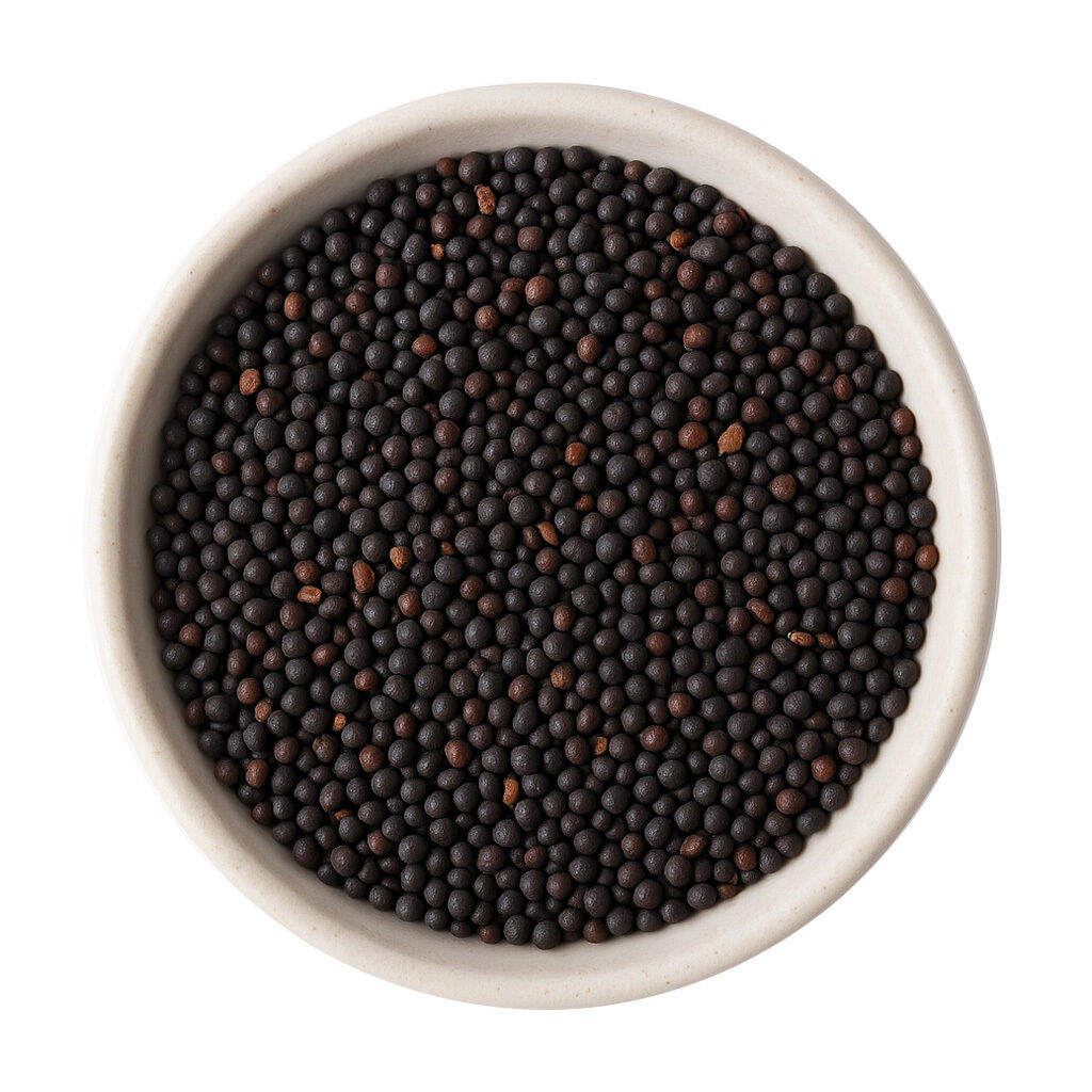 Close-up of black mustard seeds in a bowl