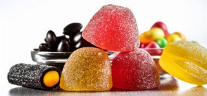 Colourful assorted jelly sweets on a white background