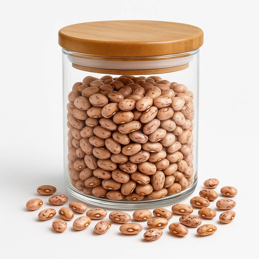 Pinto beans in a clear jar with a wooden lid