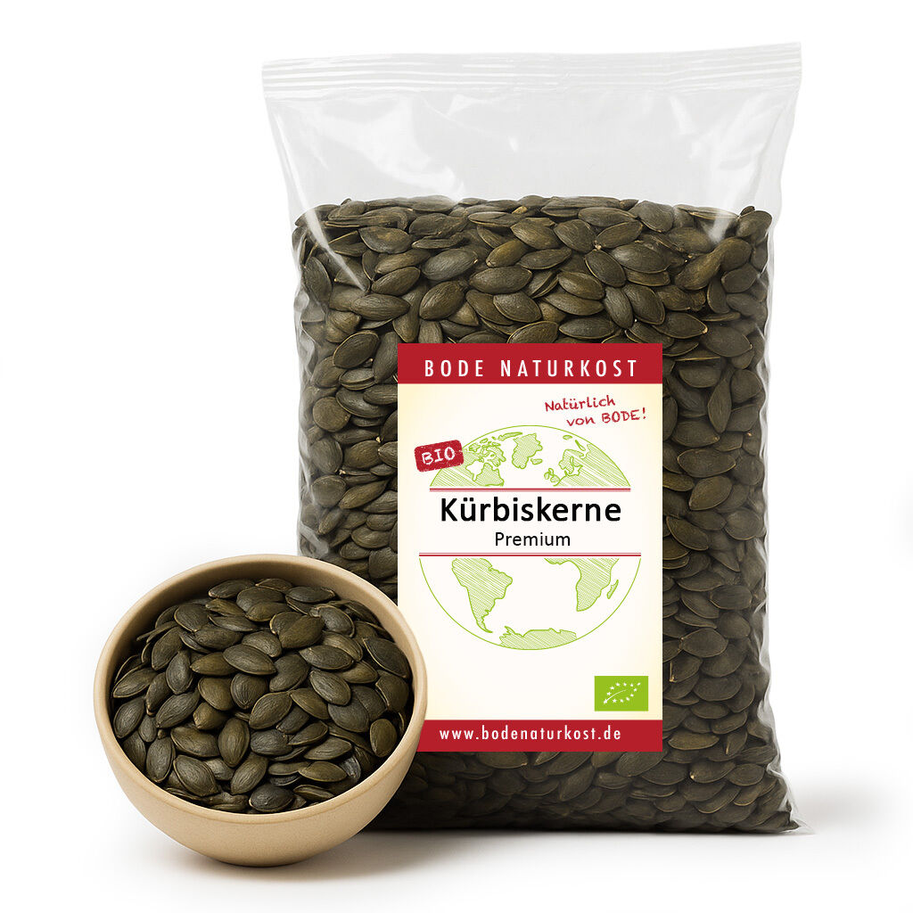 Bag of organic pumpkin seeds with bowl