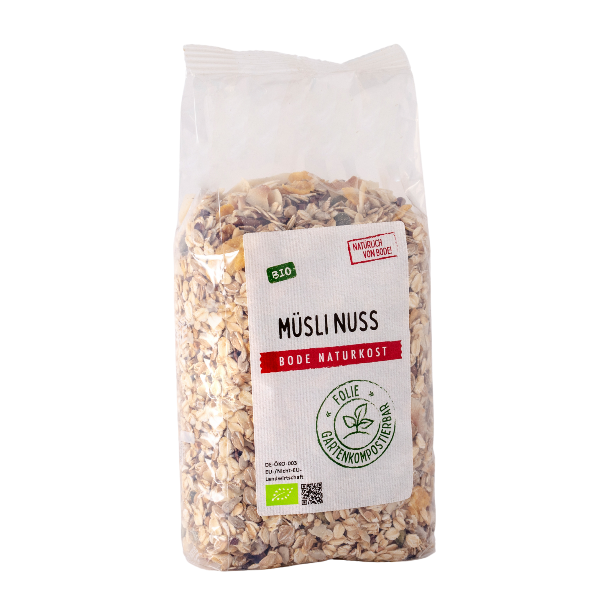 Gennemsigtig pose med økologisk müsli med nødder fra Bode Naturkost, synlige havreflager, korn og nøddebidder